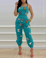 "Stay classy with this elegant butterfly print jumpsuit 🦋✨ #Fashion #BacklessStyle"